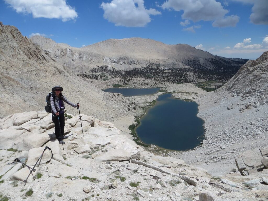 At the top of Old Army Pass with our camp below. We just had to descend the snow field and pack up before storms hit!