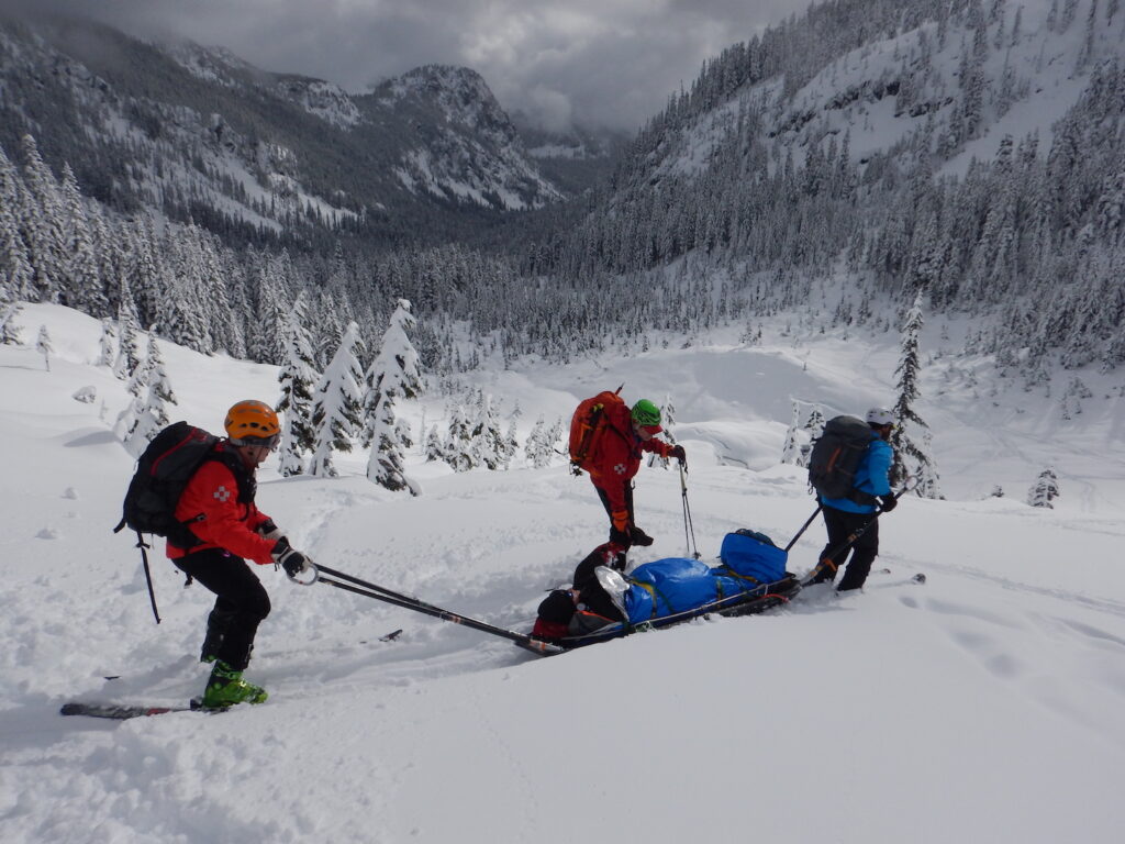 My friend Scott's fake broken back was considered the most serious injury, so he was immobilized and transported down the mountain by toboggan.