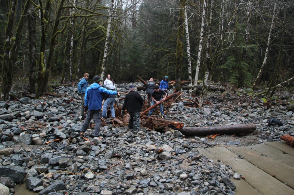 Clearing out trees and moving a lot of rocks so we could drive around the bridge