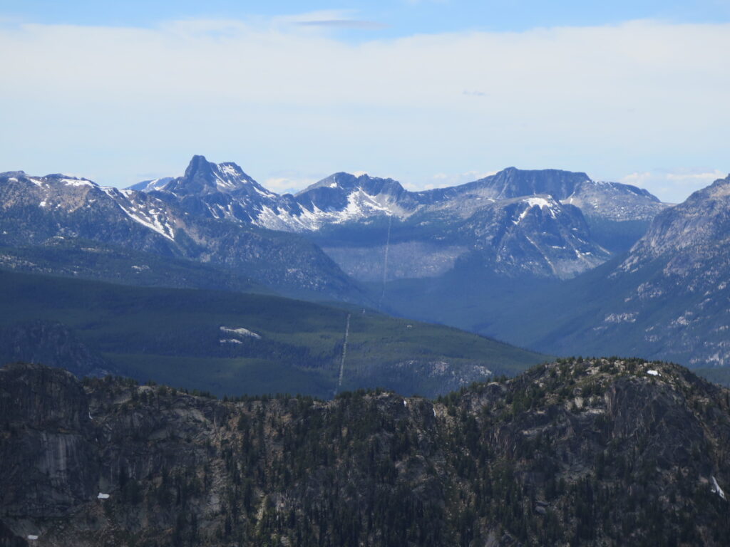 The clearcut continues on towards the Cascades and right up over the mountain!