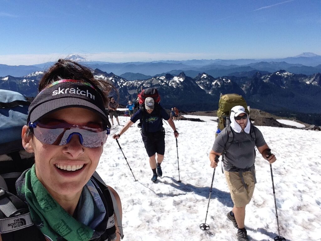 On our way up the Muir Snowfield with the Cascades out in full force behind us. What a beauty of a day!!