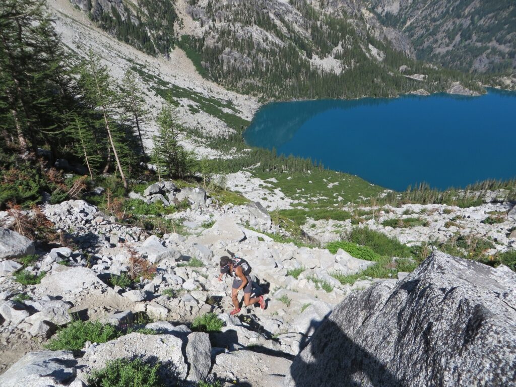 Heading up the brutal Aasgard Pass with Colchuck Lake below