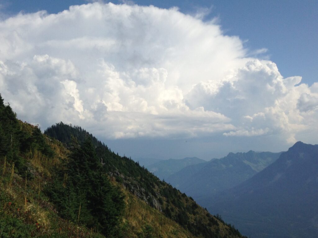 Nearing the top of Mailbox and enjoying the views of storm clouds