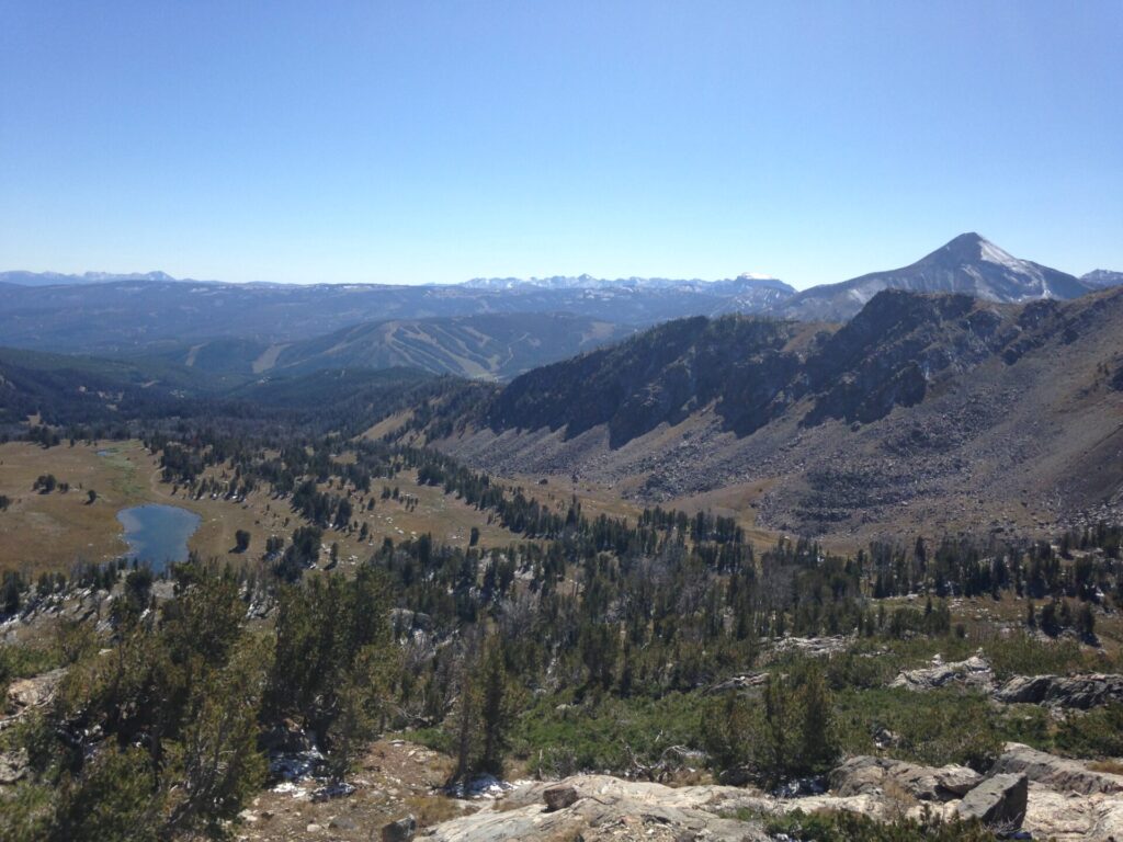 Looking down at the basin and lake from the boulder field below the Beehive Peak buttress