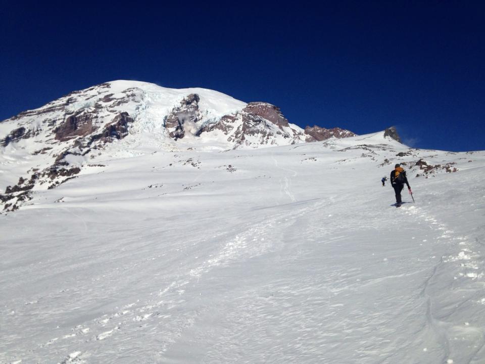 Heading up the Muir Snowfield. Mt Rainier's summit looks so close!