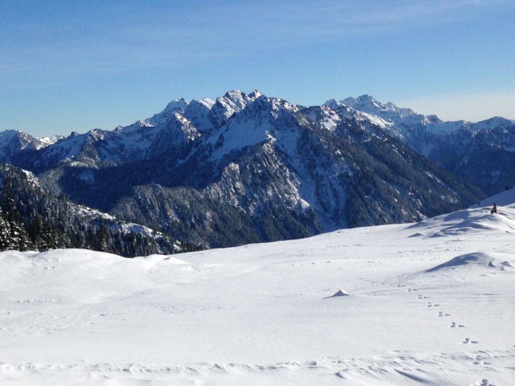 Heading up the snowfield to the summit. There was a short but steep section of snow that required some endurance to climb. But wow, those views!!